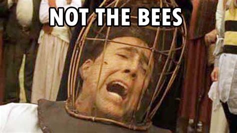 Nic Cage in the remake of The Wickerman. He has a cage over his head that contains bees. He's screaming. Text at the top of the image says "Not the bees".
